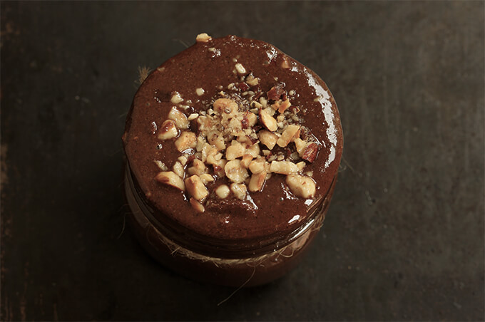 Homemade nutella - indulge in this intense dark chocolate and hazelnut homemade nutella - made with 1/3 of the sugar, and coconut oil, it's a healthier version, vegan too. | www.viktoriastable.com