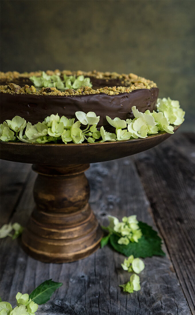 Garash cake - layers of walnut meringue and rich dark chocolate cream, enveloped in silky chocolate ganache - the ultimate chocolate lover's cake, perfect for that special occasion! | www.viktoriastable.com