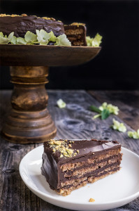 Garash cake - layers of walnut meringue and rich dark chocolate cream, enveloped in silky chocolate ganache - the ultimate chocolate lover's cake, perfect for that special occasion! | www.viktoriastable.com