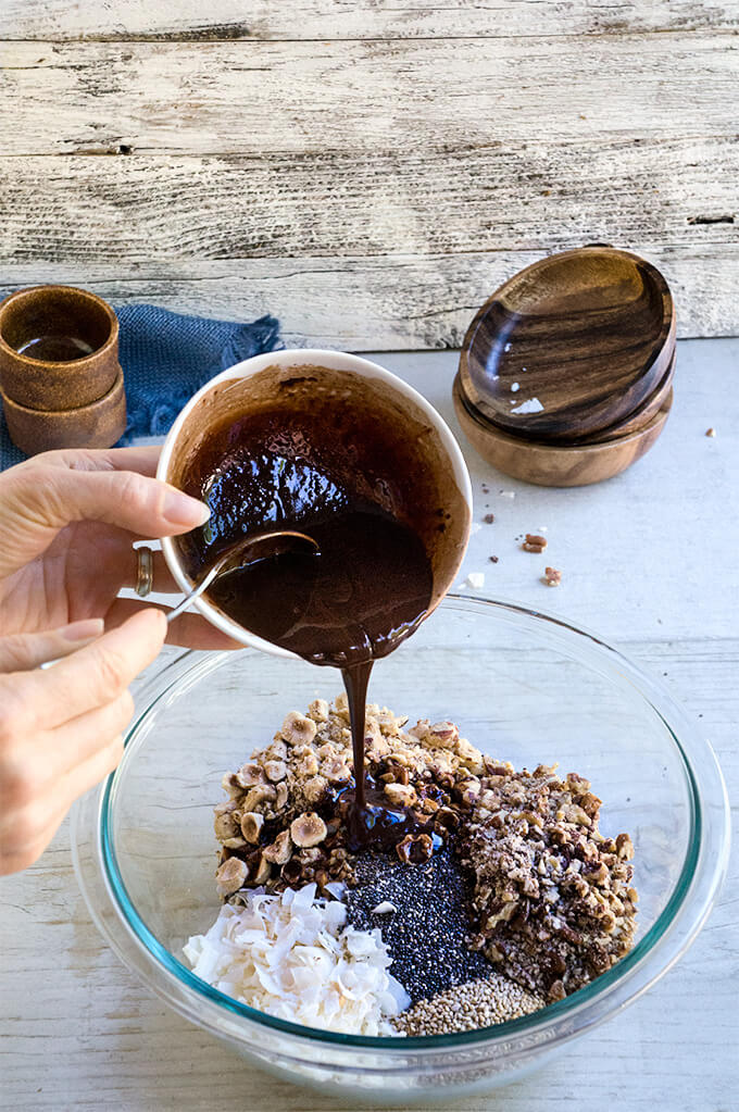 Dark Chocolate Granola - nutty, crunchy, and full of addictive hazelnut-chocolate flavors, gluten free and vegan too. | www.viktoriastable.com