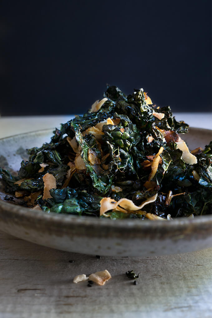 Kale salad with toasted coconut and sesame oil - this fantastic salad has it all - it's crunchy, it's salty, it's satisfying, and feels like comfort food, yet is a health bomb. | www.viktoriastable.com