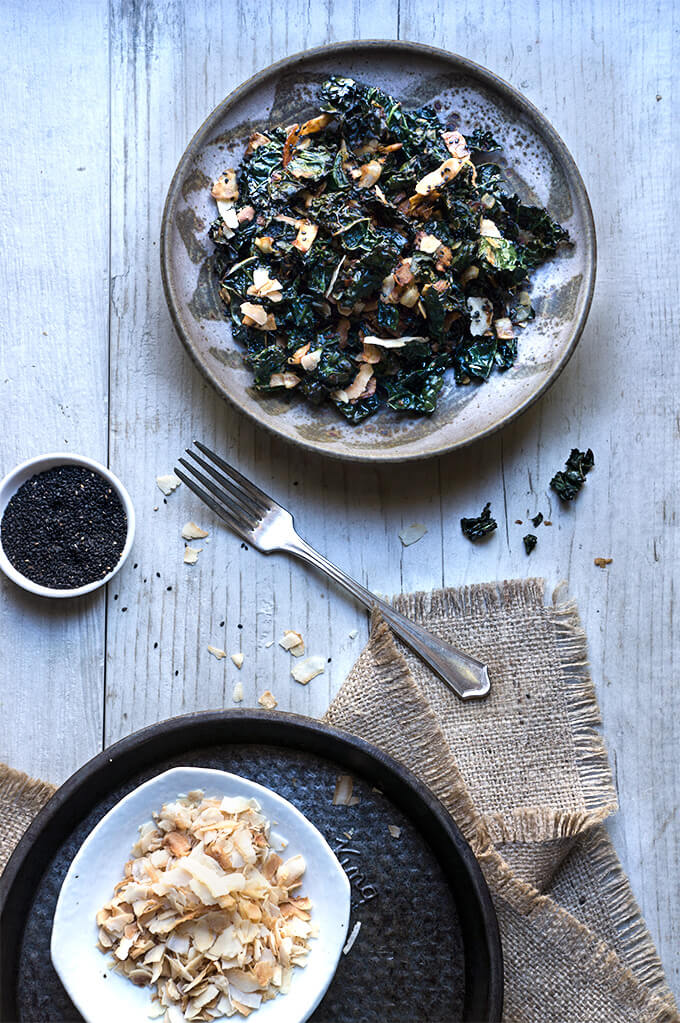 Kale salad with toasted coconut and sesame oil - this fantastic salad has it all - it's crunchy, it's salty, it's satisfying, and feels like comfort food, yet is a health bomb. | www.viktoriastable.com
