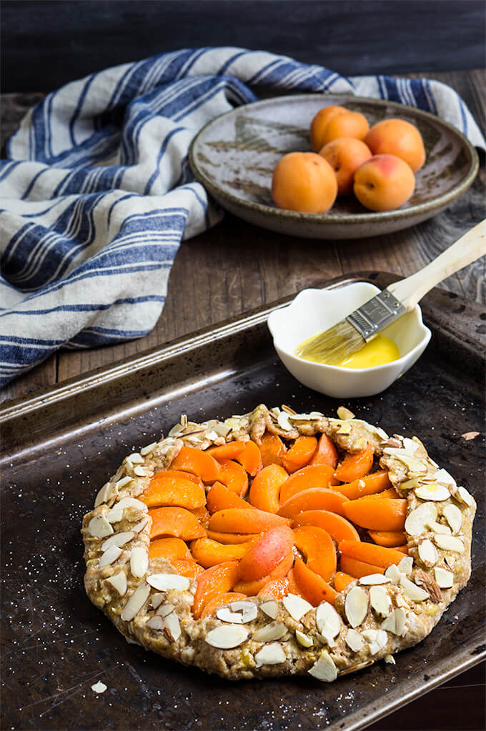 Apricot almond galette - flakey buttery crust, almond frangipane filling, and jammy sweet apricot on top complete this rustic summer galette. | www.viktoriastable.com