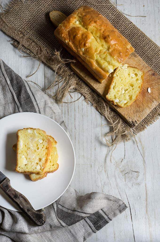 Feta cheese quick bread - fluffy, moist and buttery, this savory quick bread recipe is ideal for breakfast, snack or even dinner.