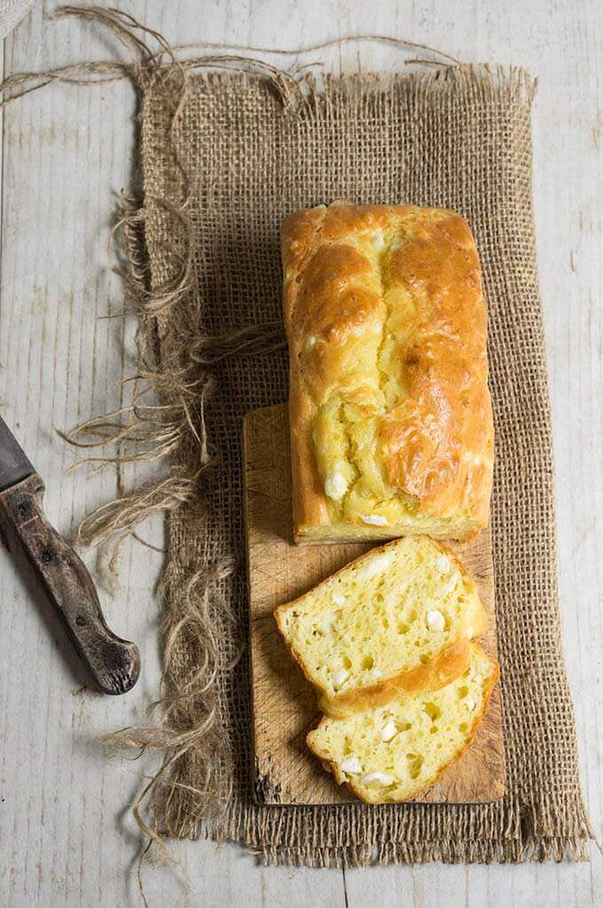 Feta cheese quick bread - fluffy, moist and buttery, this savory quick bread recipe is ideal for breakfast, snack or even dinner.