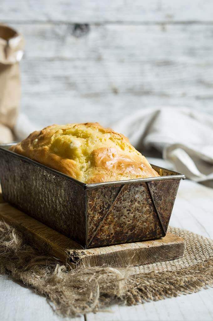 Feta cheese quick bread - fluffy, moist and buttery, this savory quick bread recipe is ideal for breakfast, snack or even dinner.