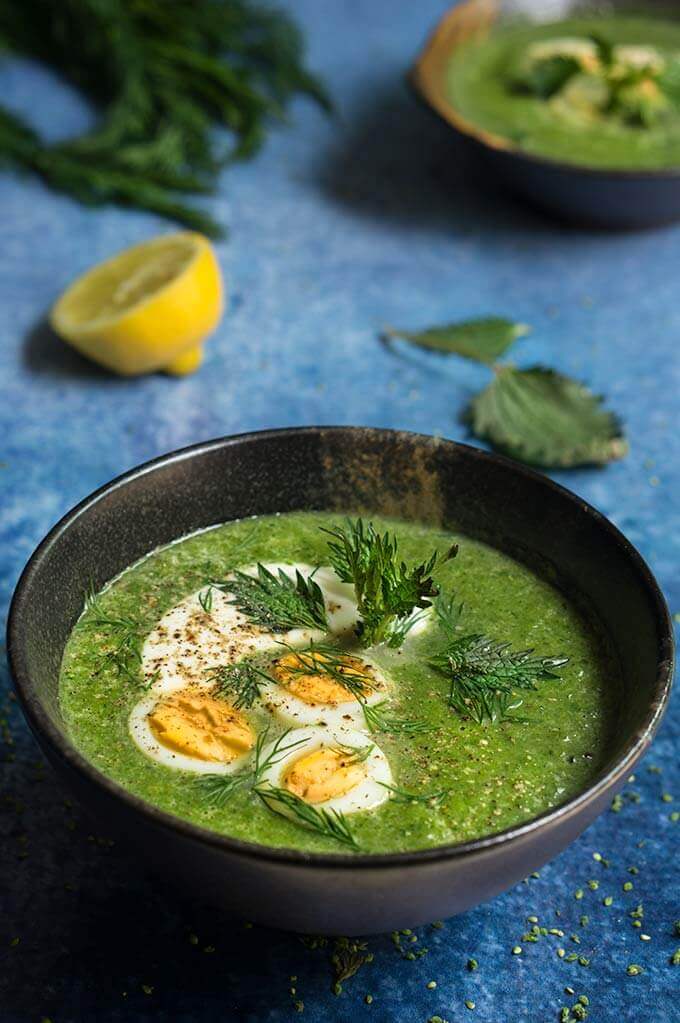 Nettle and green garlic soup - this creamy soup tastes like the spring, with flavors of mild garlic, aromatic dill, and fresh lemon, and is packed with cleansing nutrients and minerals. | www.viktoriastable.com
