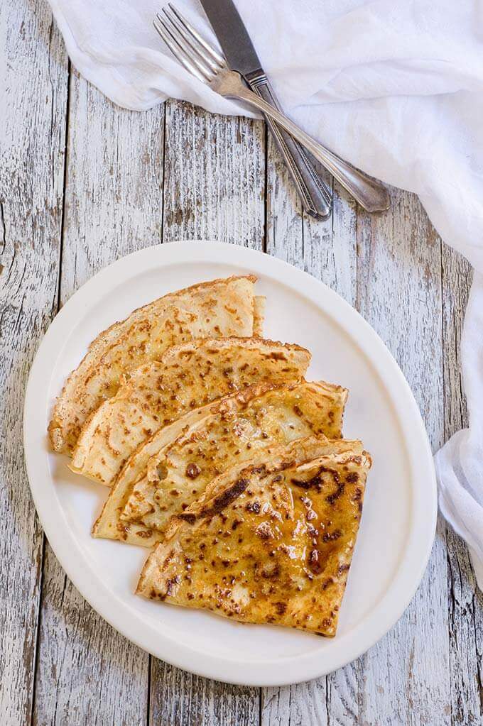 Crispy caramelized crepes - classic French crepes, crisped up with a thin layer of buttery, salted caramel on one side - they are simply too good to miss. | www.viktoriastable.com