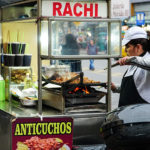 Street food vendor selling anticuchos - Lima, Peru